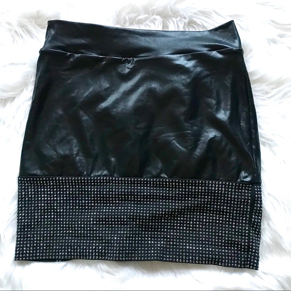 BEBE leather rhinestone mini skirt